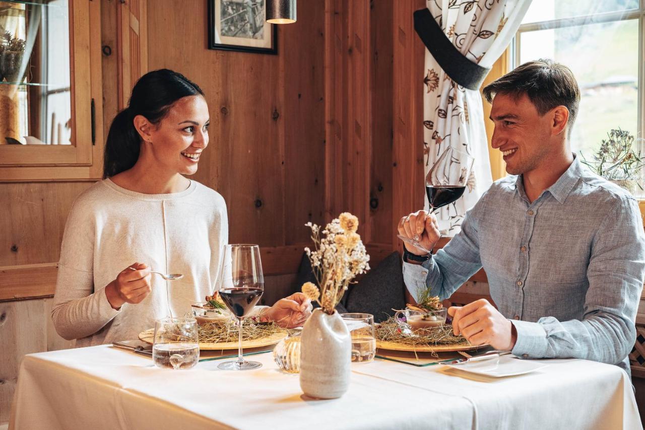 Hotel Monika Sexten Exteriör bild A couple dining at a restaurant